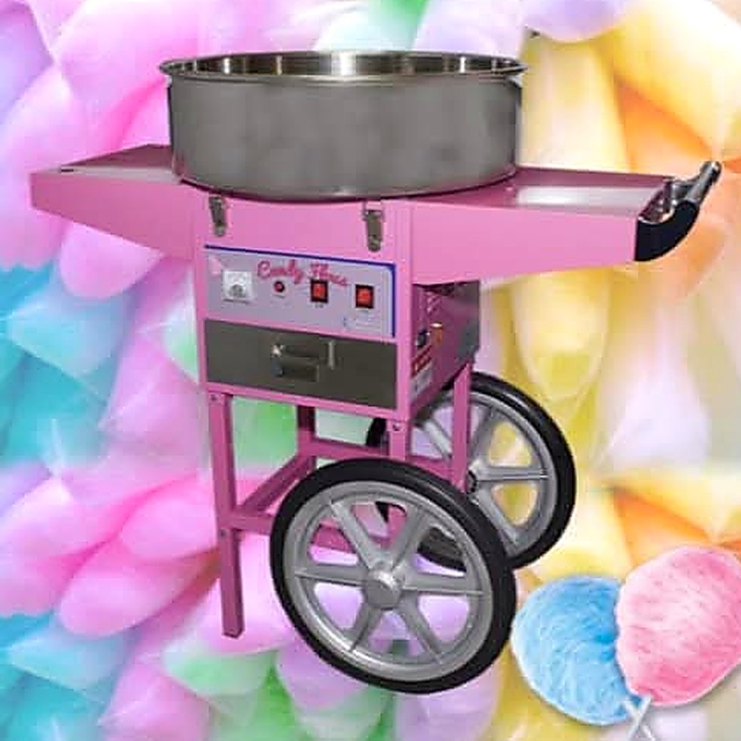 Pink candy floss machine on a wheeled cart